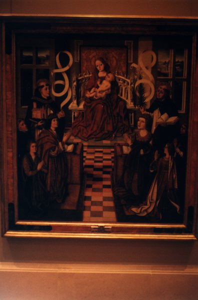 Peinture Renaissance  avec Vierge à l’enfant et personnages en adoration.
